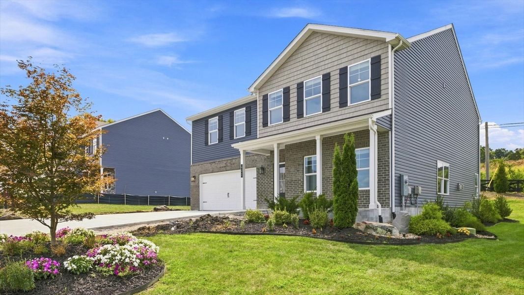 Front exterior of a new home in Mary's Pointe, Clinton, TN, highlighting curb appeal (Image 2). Front exterior of a new home in Mary's Pointe, Clinton, TN, highlighting curb appeal (Image 2).