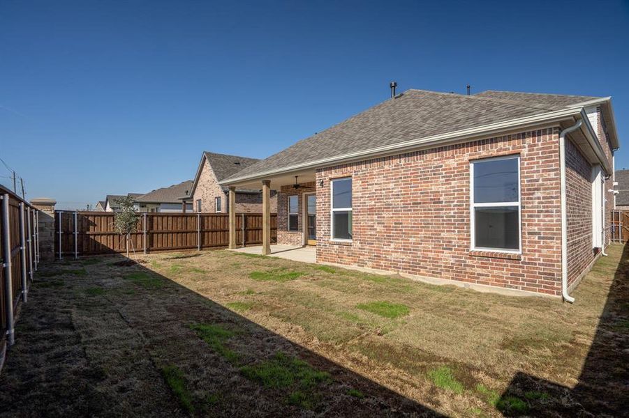 Front exterior of a new home in Inspiration, St. Paul, TX, highlighting curb appeal (Image 1). Front exterior of a new home in Inspiration, St. Paul, TX, highlighting curb appeal (Image 1).