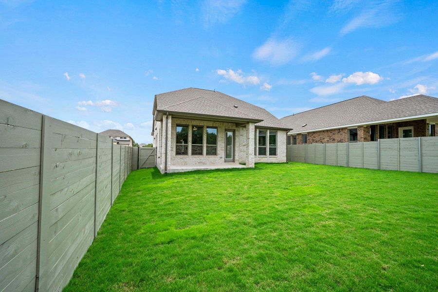 Rear of Home and Private Backyard