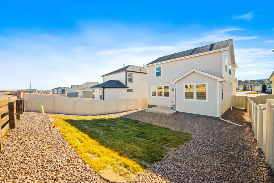 Exterior details and patio area of a home in Trails at Aspen Ridge-3, Colorado Springs (Image 3). Exterior details and patio area of a home in Trails at Aspen Ridge-3, Colorado Springs (Image 3).