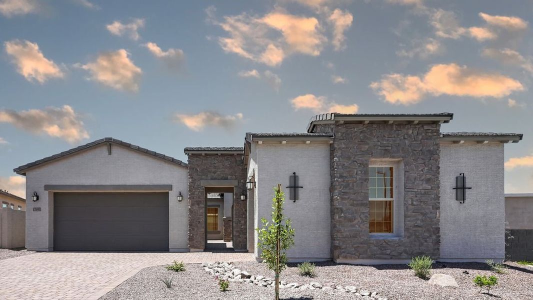 Front exterior of a new home in Estrella, Goodyear, AZ, highlighting curb appeal (Image 1). Front exterior of a new home in Estrella, Goodyear, AZ, highlighting curb appeal (Image 1).