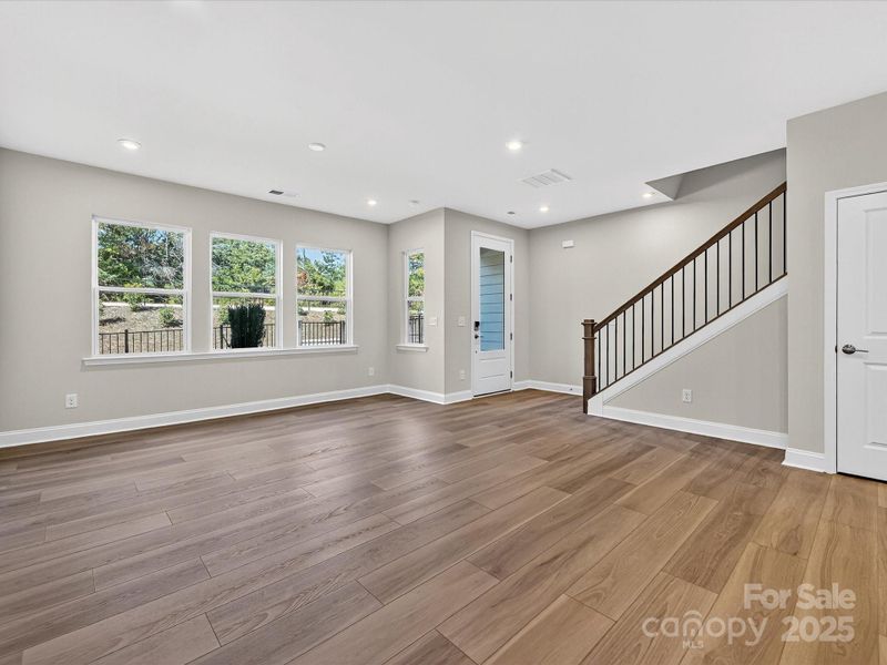 Great Room with Wall of Windows Adding Light to the Space.