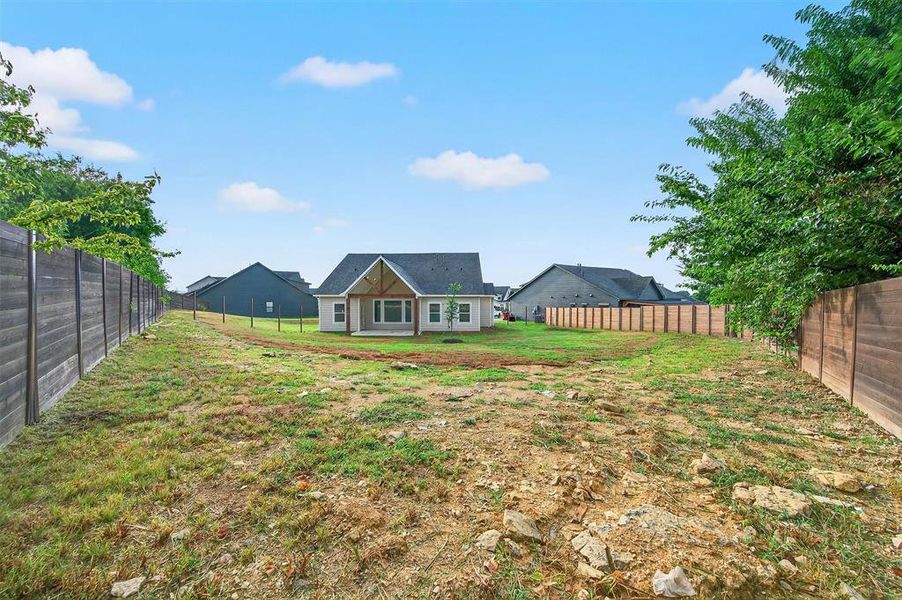 Front exterior of a new home in , Sherman, TX, highlighting curb appeal (Image 1).