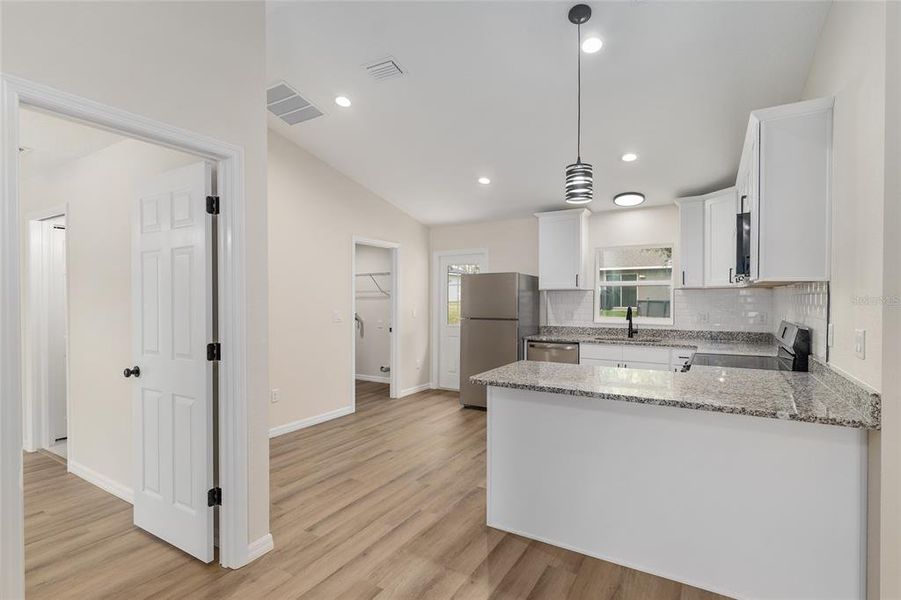Furnished interior view inside a new home in , Dunnellon (Image 9).