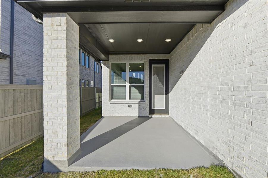 Exterior details and patio area of a home in Pecan Square: 40ft. lots, Northlake (Image 17).
