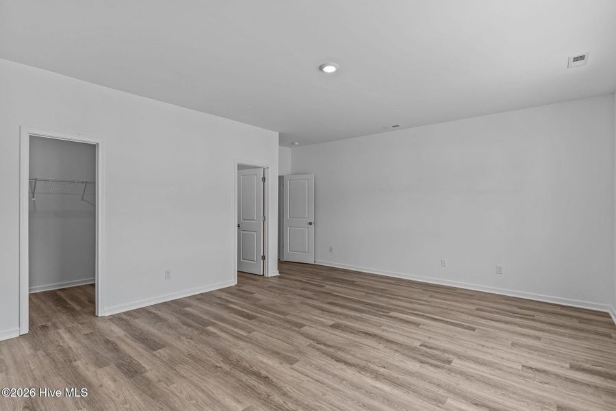 Spacious, unfurnished interior of a new home in Coastal Haven, Leland (Image 18). Spacious, unfurnished interior of a new home in Coastal Haven, Leland (Image 18).