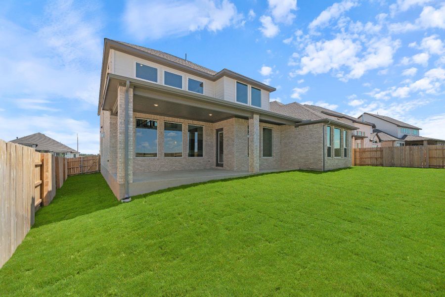 Rear of Home and Private Backyard