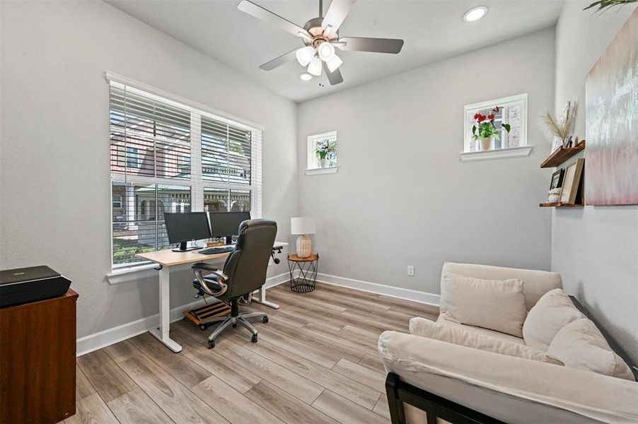 Office space with ceiling fan, wood finished floors, and recessed lighting Office space with ceiling fan, wood finished floors, and recessed lighting