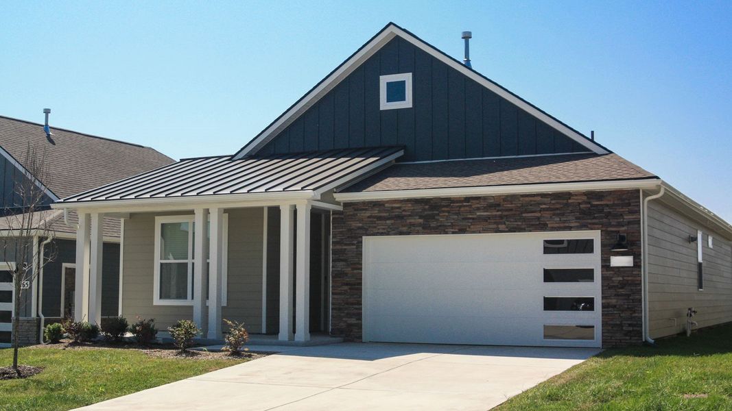 Front exterior of a new home in Nexus South, Gallatin, TN, highlighting curb appeal (Image 1). Front exterior of a new home in Nexus South, Gallatin, TN, highlighting curb appeal (Image 1).