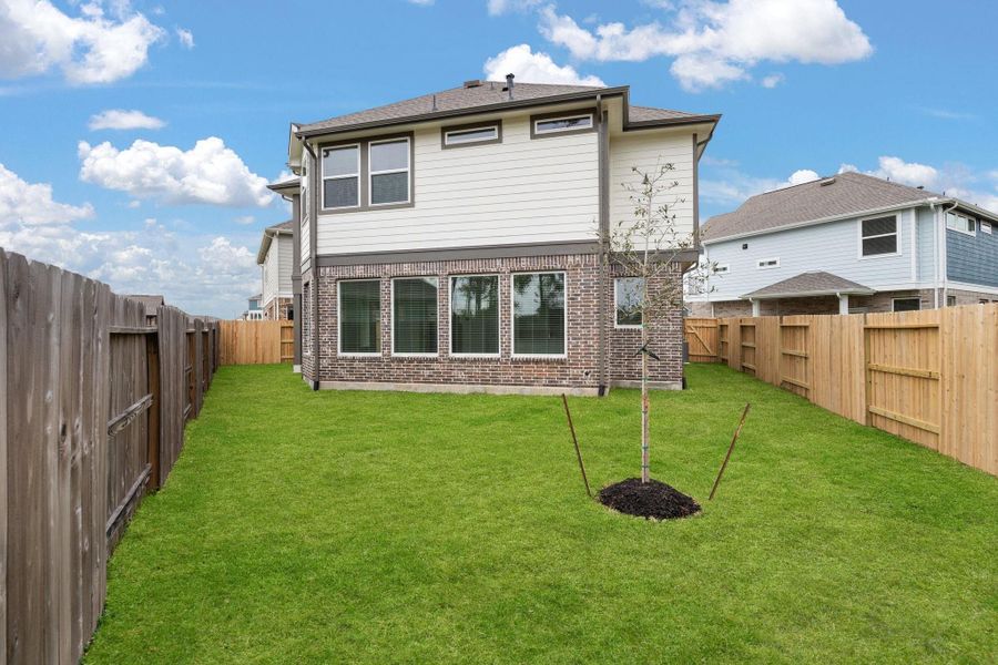 Exterior details and patio area of a home in Elyson, Katy (Image 19).