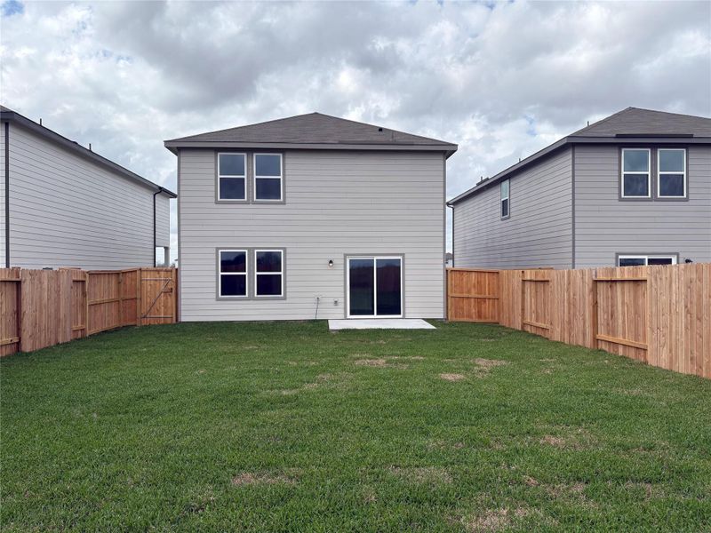 Exterior details and patio area of a home in Vacek Pointe, Richmond (Image 2). Exterior details and patio area of a home in Vacek Pointe, Richmond (Image 2).