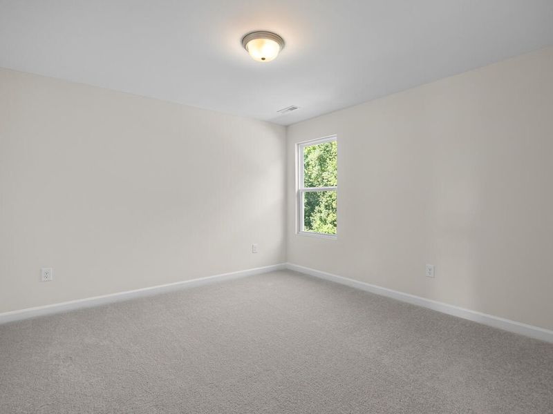 Spacious, unfurnished interior of a new home in Woodland Crossing, Zebulon (Image 26).