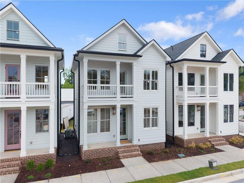Front exterior of a new home in , Gainesville, GA, highlighting curb appeal (Image 23).