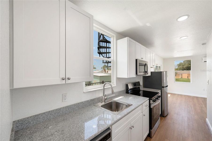 Furnished interior view inside a new home in , Englewood (Image 3). Furnished interior view inside a new home in , Englewood (Image 3).