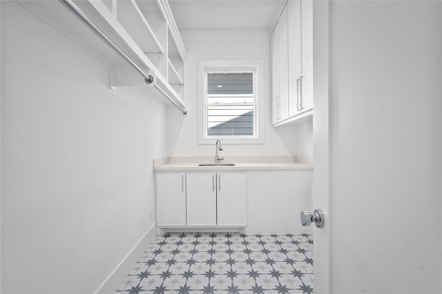 In addition to another secondary bedroom, you'll find the large walk-in utility room on the 2nd level. Not pictured are the two hallway closets found on this level of the home.