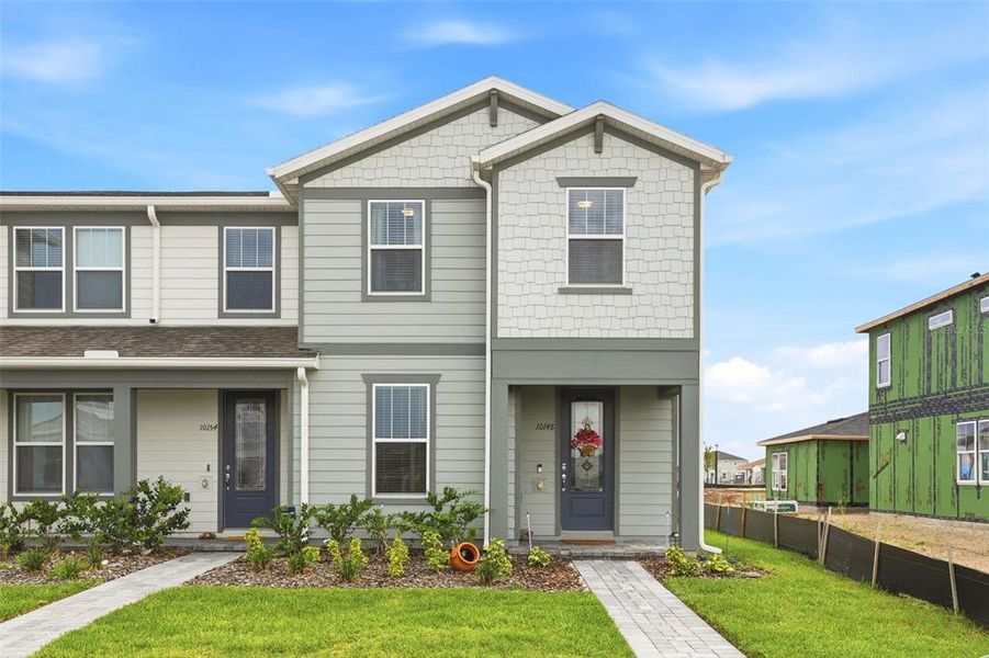 Front exterior of a new home in , Orlando, FL, highlighting curb appeal (Image 2). Front exterior of a new home in , Orlando, FL, highlighting curb appeal (Image 2).