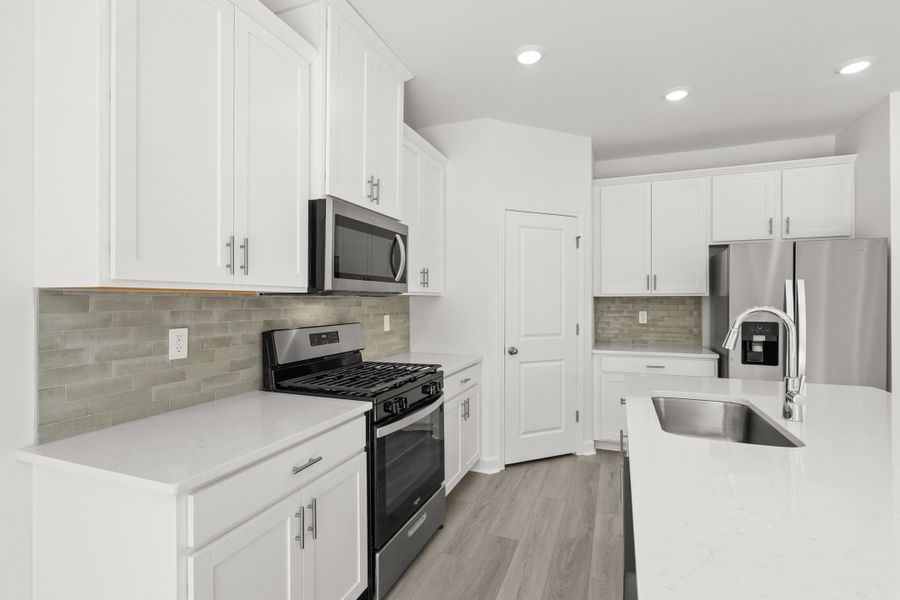 Furnished interior view inside a new home in Cypress Ridge - The Boardwalk Series, Longs (Image 5).