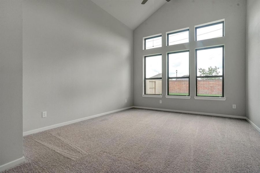 Spacious, unfurnished interior of a new home in Sunterra 50s, Katy (Image 5).
