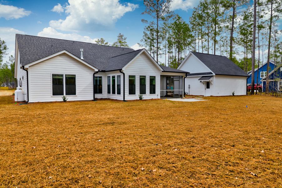Representative exterior photo of a completed home built from the Sumter by Center Park Homes in Sweetbay Cove, Summerville, SC (Image 33). Representative exterior photo of a completed home built from the Sumter by Center Park Homes in Sweetbay Cove, Summerville, SC (Image 33).