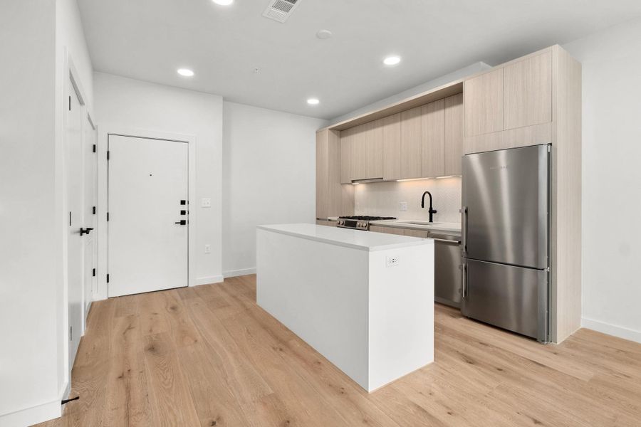 Furnished interior view inside a new home in One Oak, Austin (Image 12).