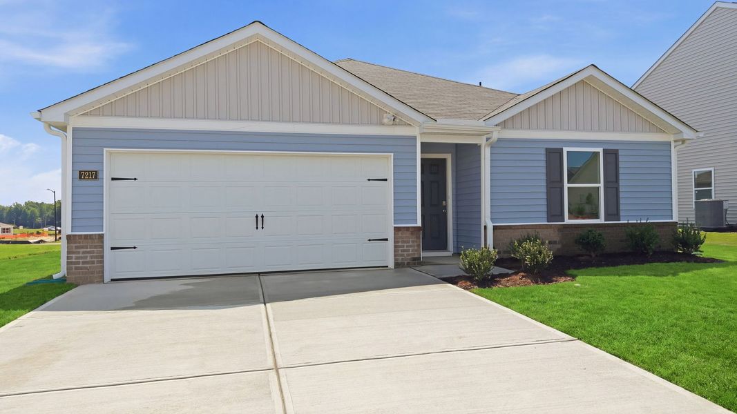 Front exterior of a new home in Hunter Hill, Rocky Mount, NC, highlighting curb appeal (Image 17). Front exterior of a new home in Hunter Hill, Rocky Mount, NC, highlighting curb appeal (Image 17).