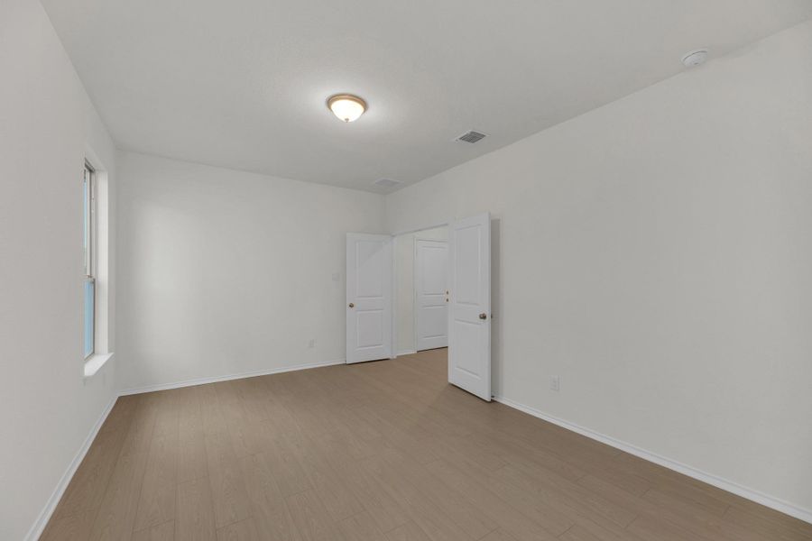 Spacious, unfurnished interior of a new home in Retreat at San Gabriel, Georgetown (Image 34).