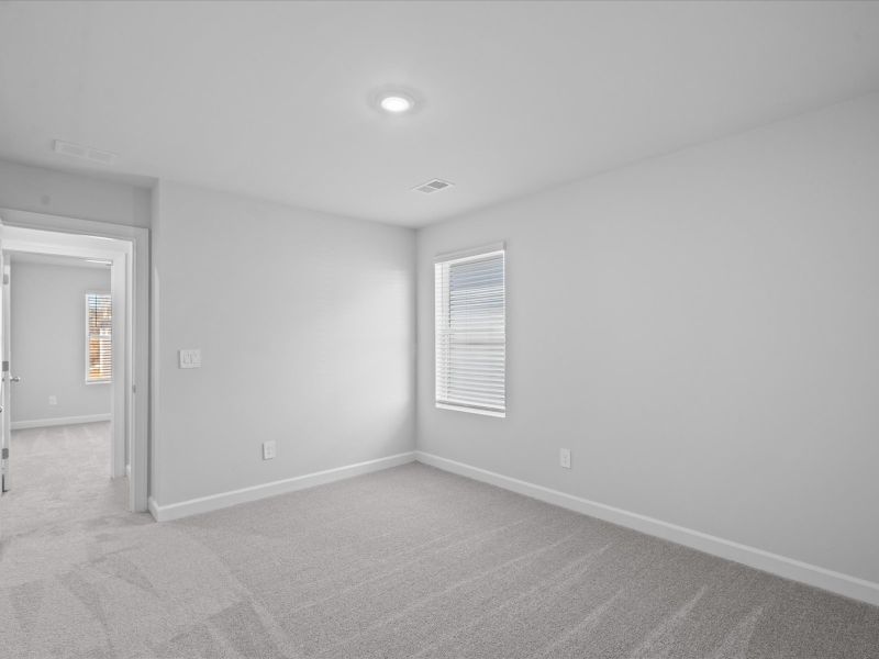 Spacious, unfurnished interior of a new home in The Farm at Wells Creek - Signature Collection, Gray Court (Image 19).