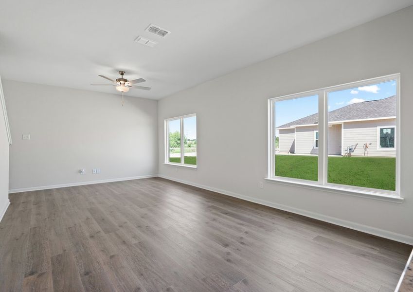 The family room is spacious and has plenty of space for large furniture.