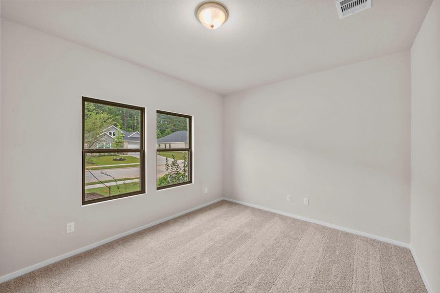 Spacious, unfurnished interior of a new home in Westridge Cove, Conroe (Image 24).