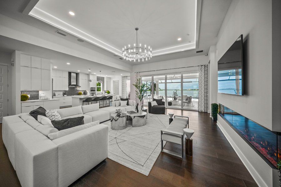 Representative furnished interior of a home built from the Aviso by Homes by Towne in Shellstone at Waterside, Sarasota (Image 6).