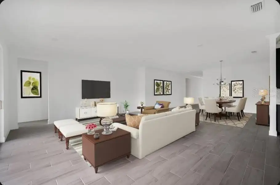 Furnished interior view inside a new home in Harvest at Ovation, Winter Garden (Image 7). Furnished interior view inside a new home in Harvest at Ovation, Winter Garden (Image 7).