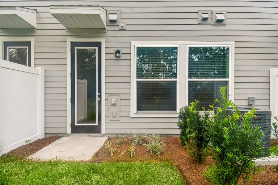 Exterior details and patio area of a home in Preserve at The Cays – The Harbor Series, Daytona Beach (Image 4).