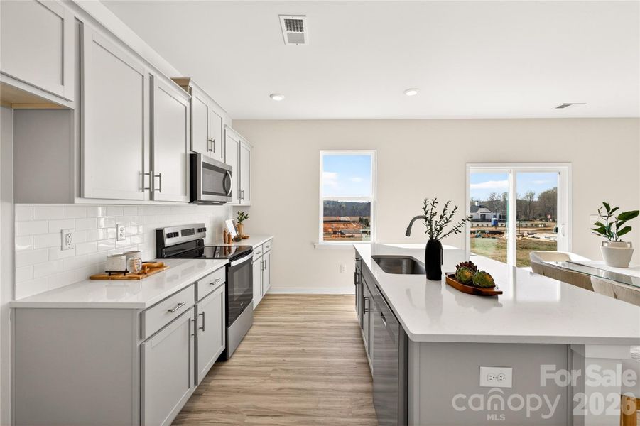 Furnished interior view inside a new home in The Falls at Newton, Newton (Image 11).