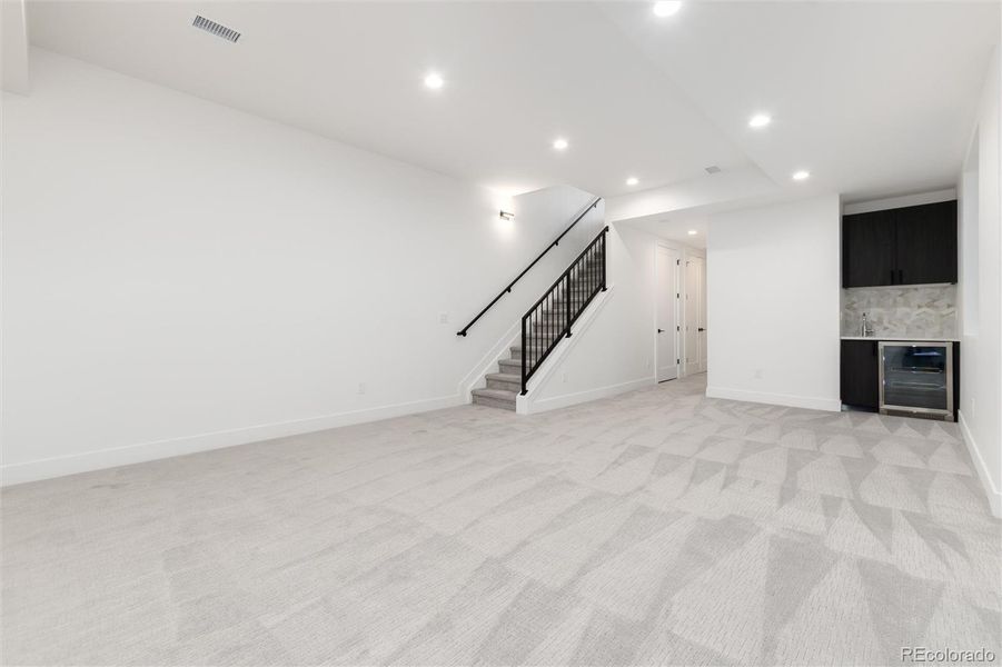 Basement Family Room with Wet Bar and Beverage Refrigerator