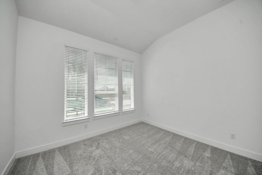 Spacious, unfurnished interior of a new home in Meridiana Courtyard Collection, Manvel (Image 28).