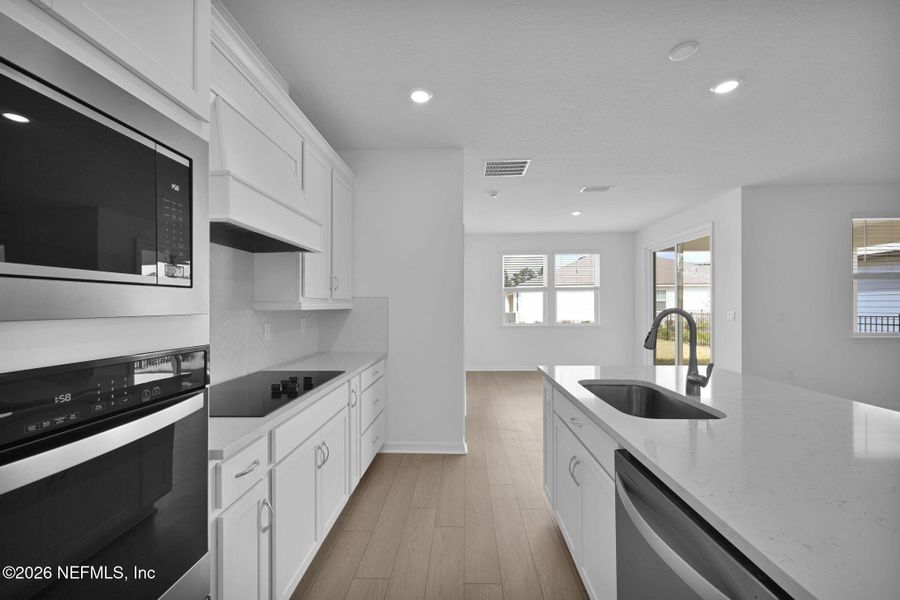 Furnished interior view inside a new home in Hyland Trail, Green Cove Springs (Image 10).