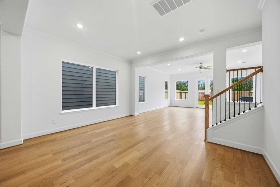 Crown molding throughout the downstairs adds an elegant touch to your everyday dining experience.