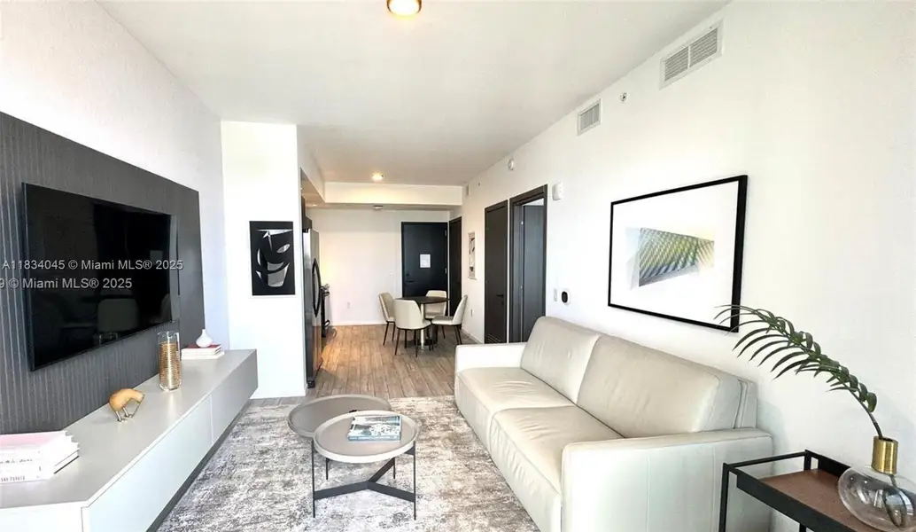 Furnished interior view inside a new home in The Elser Hotel & Residences, Miami (Image 1).