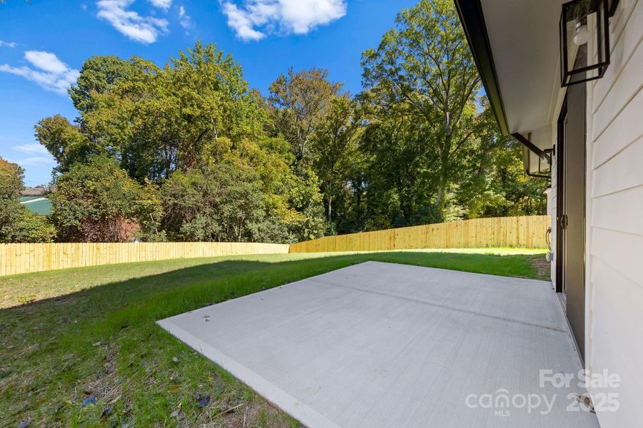 Exterior details and patio area of a home in , Charlotte (Image 3). Exterior details and patio area of a home in , Charlotte (Image 3).