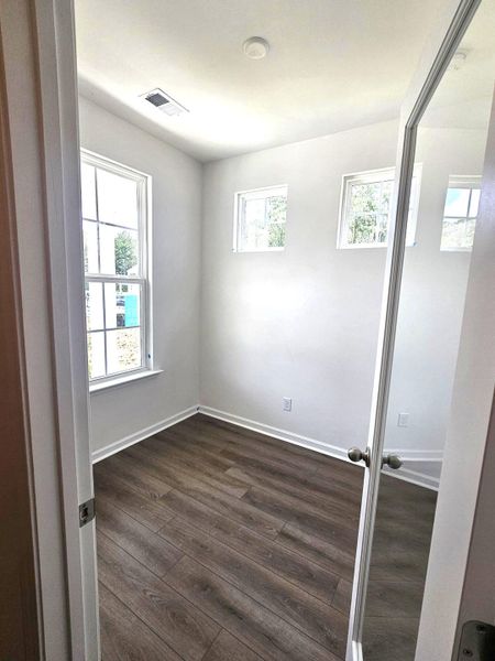 Spacious, unfurnished interior of a new home in Creekside at Andrews, Summerville (Image 12).