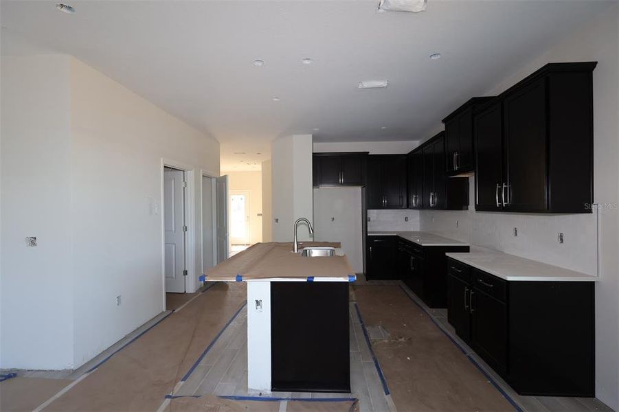 In-progress construction of a new home in Center Lake on the Park, St. Cloud, FL (Image 7).