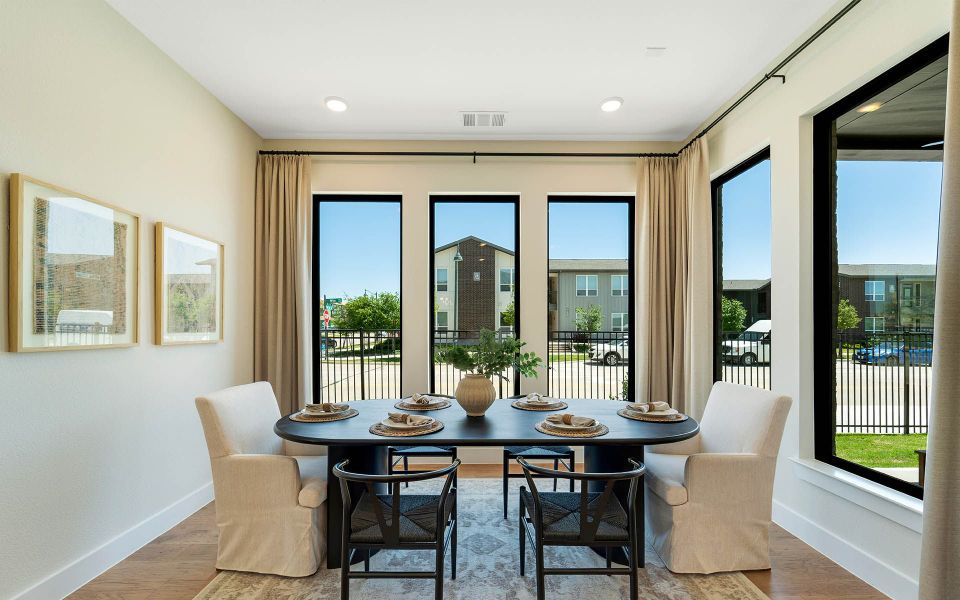 Representative furnished interior of a home built from the Rainier by CastleRock Communities in The Summit at Center Stage, Keller (Image 12).