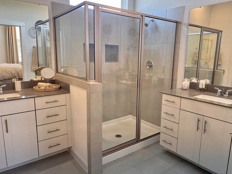 Representative furnished interior of a home built from the Saxony – 45′ Lot by Chesmar Homes in Sunterra, Katy (Image 8).