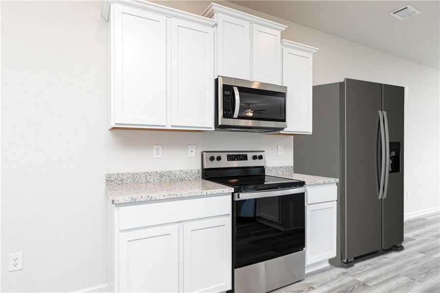 Furnished interior view inside a new home in , Conyers (Image 9).