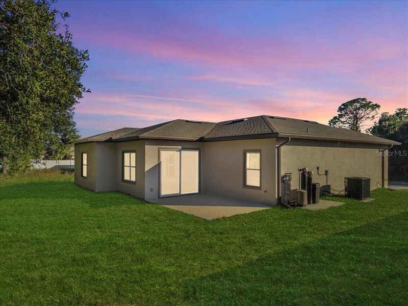 Exterior details and patio area of a home in , North Port (Image 24).