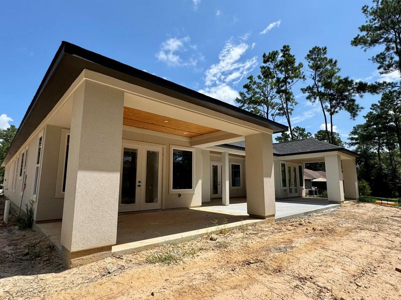 Exterior details and patio area of a home in , Splendora (Image 29).