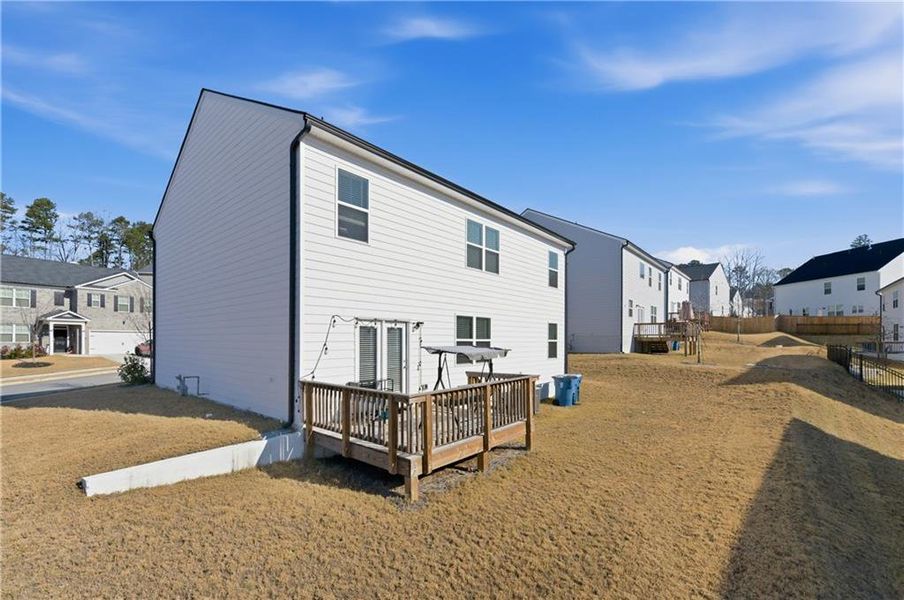 Exterior details and patio area of a home in Brooks Village, Dacula (Image 31).