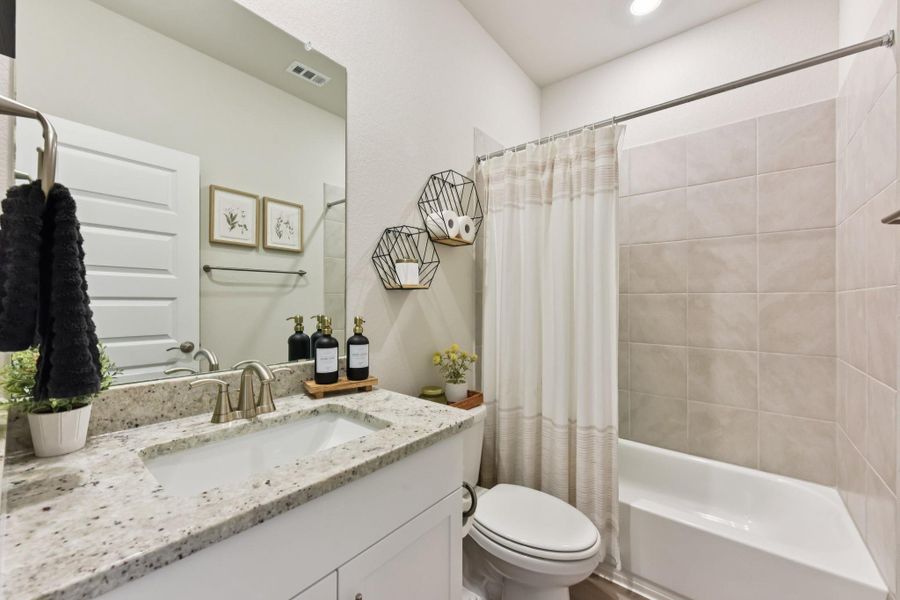 Furnished interior view inside a new home in Big Sky Ranch - Executive Collection, Dripping Springs (Image 28).