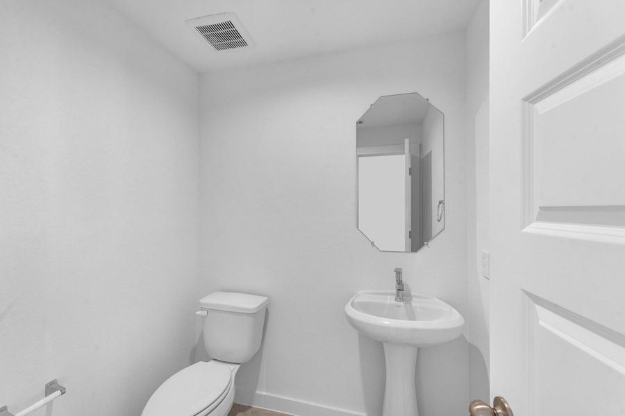 Furnished interior view inside a new home in Grand Mason Crossing, Katy (Image 9).