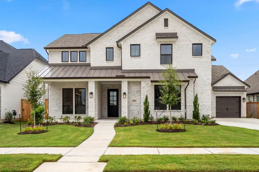 Front exterior of a new home in , Fulshear, TX, highlighting curb appeal (Image 2).